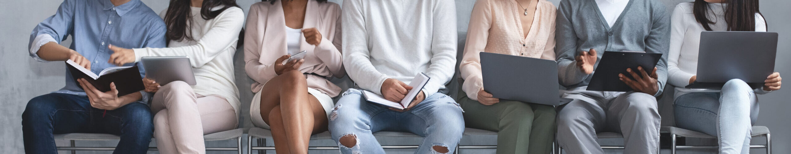 Young creative people waiting for job interview